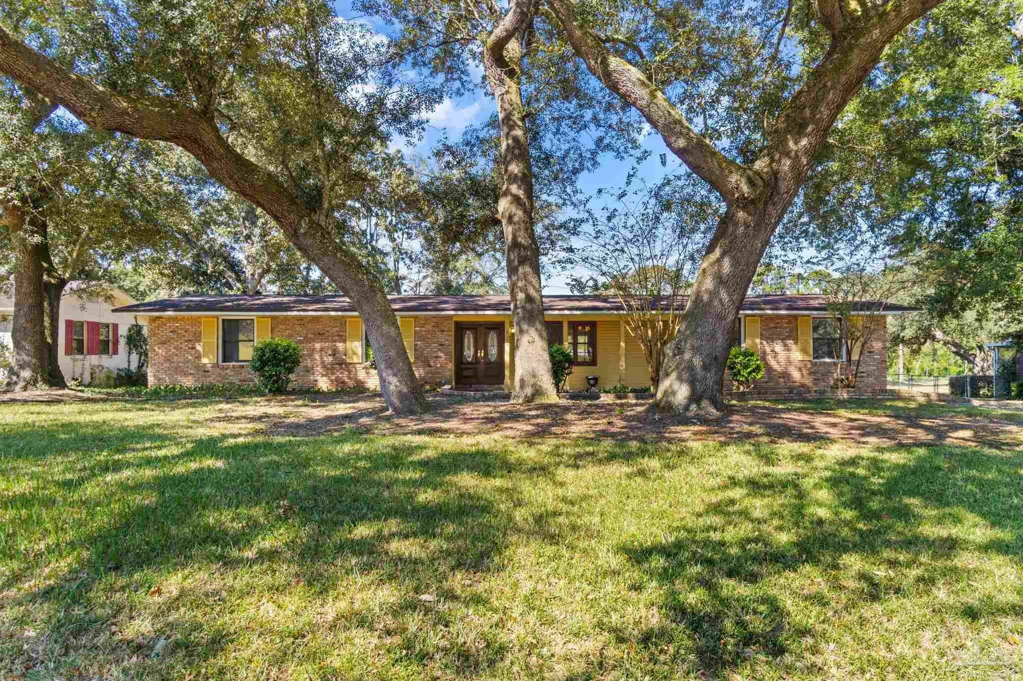 Property Photo:  8819 Burning Tree Rd  FL 32514 