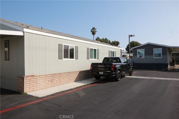 Property Photo:  7652 Garfield Avenue 86  CA 92648 