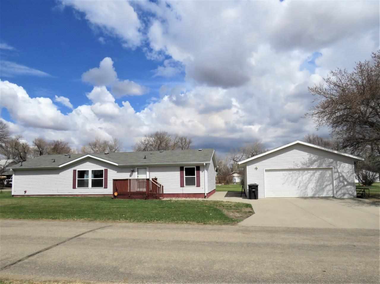Property Photo: 201 Moore Ave NE ND 58718
