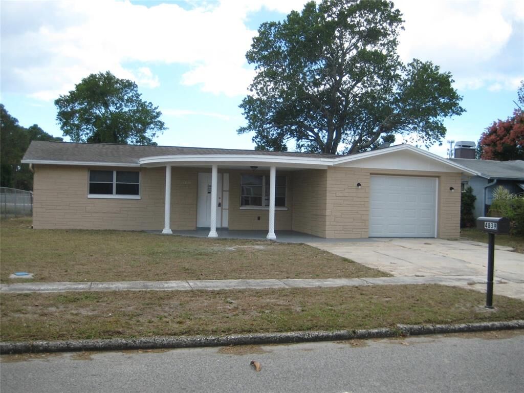 Property Photo:  4839 Alcea St  FL 34652 