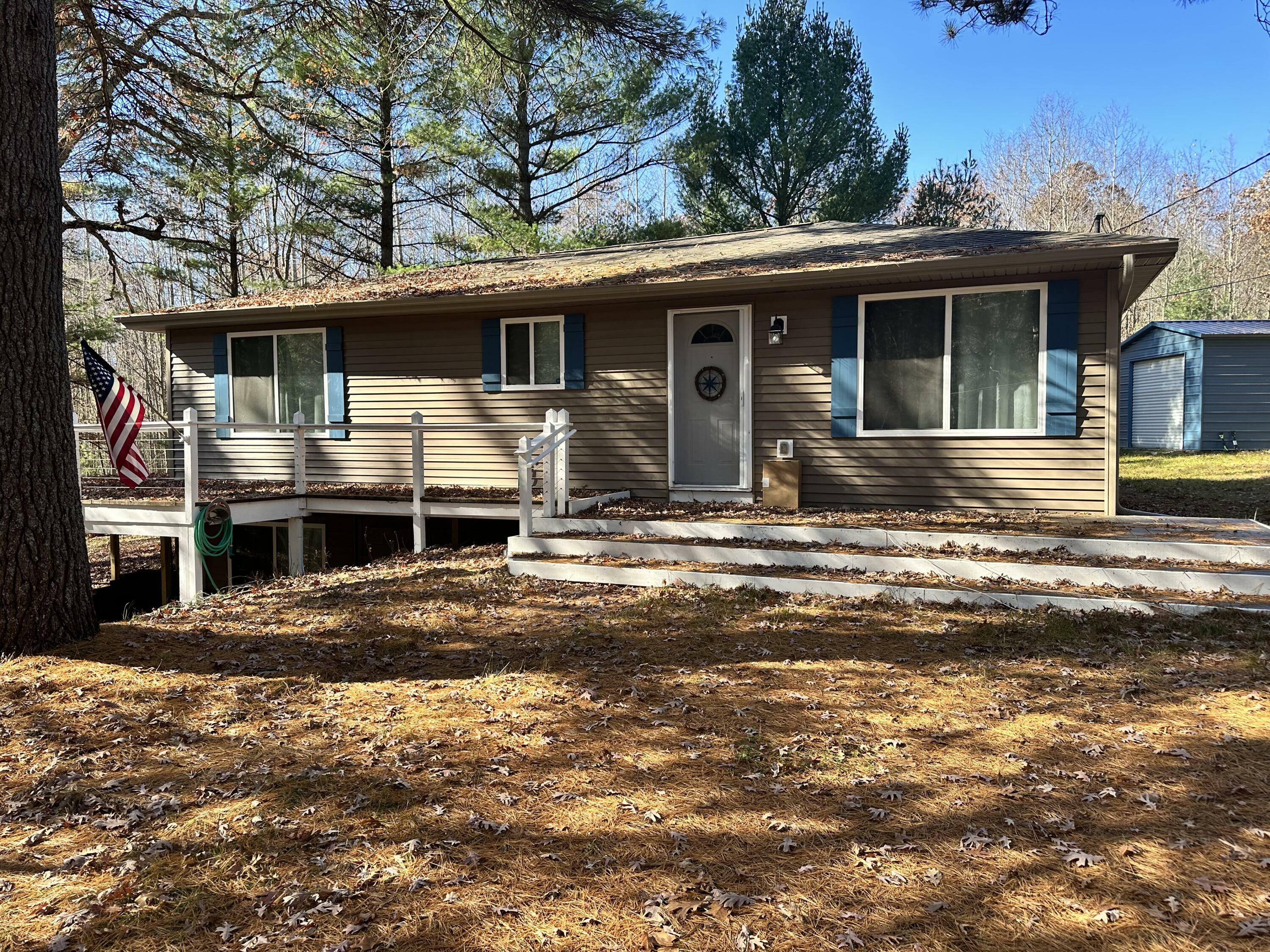 Property Photo:  7467 E Higgins Lake Drive  MI 48653 