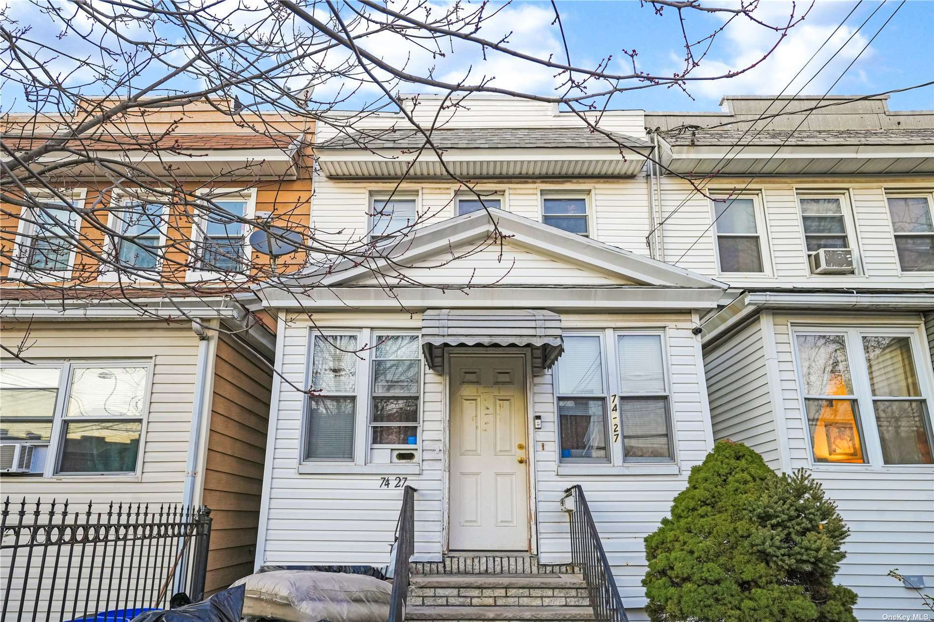 Property Photo:  74-27 93rd Avenue  NY 11421 