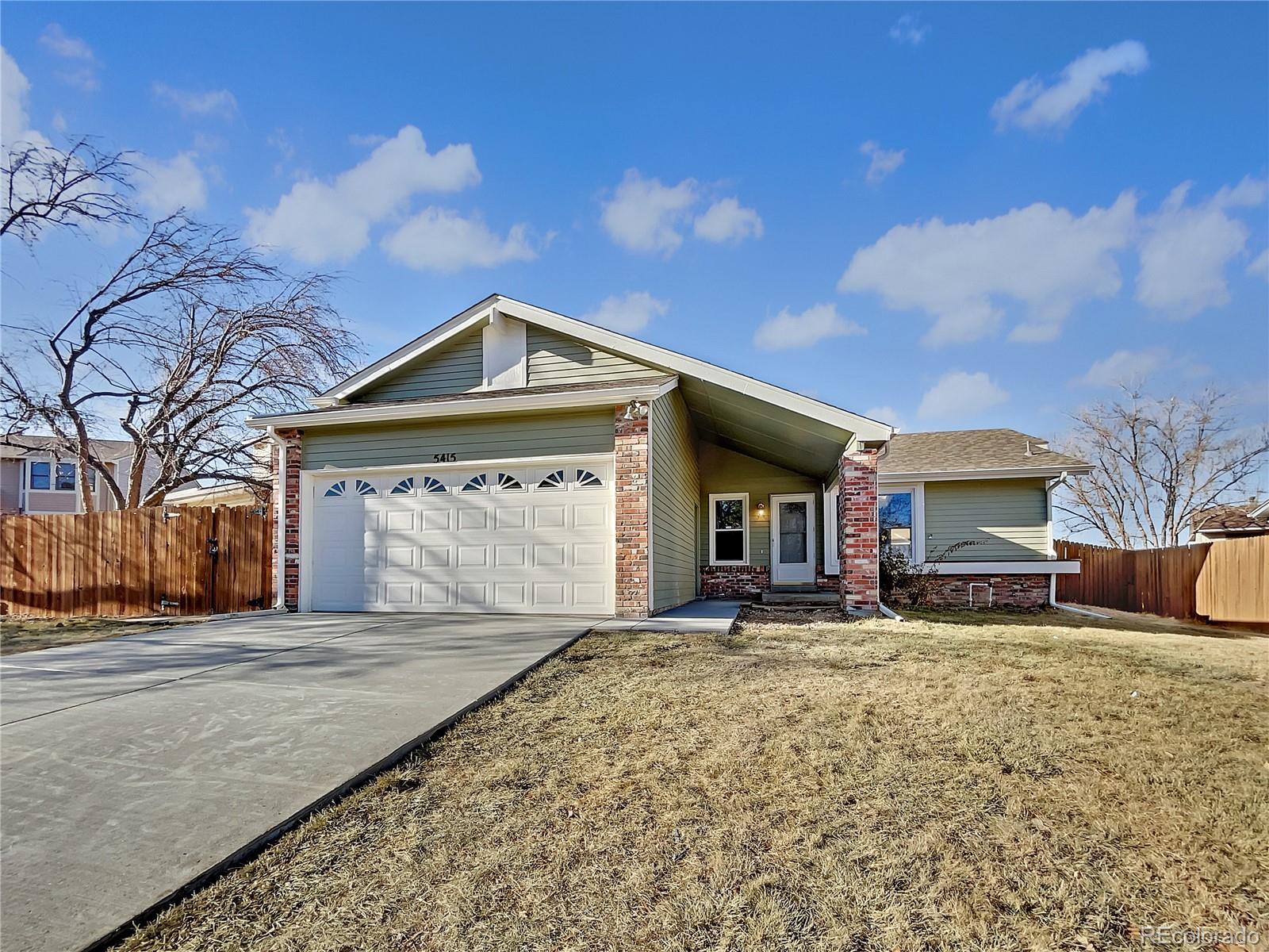 Property Photo: 5415 S Walden Court CO 80015