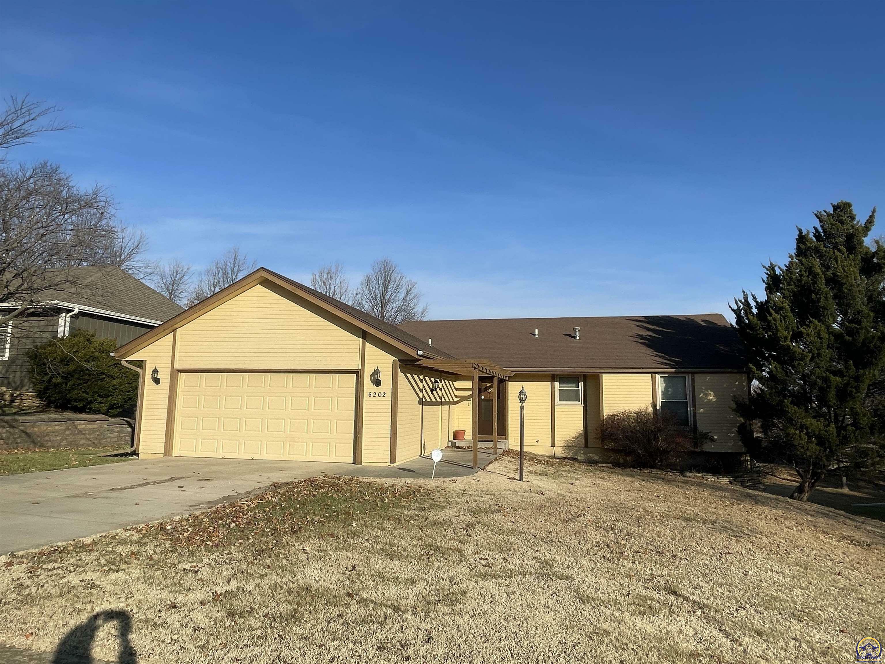 Property Photo:  6202 SW 21st Ter  KS 66614 