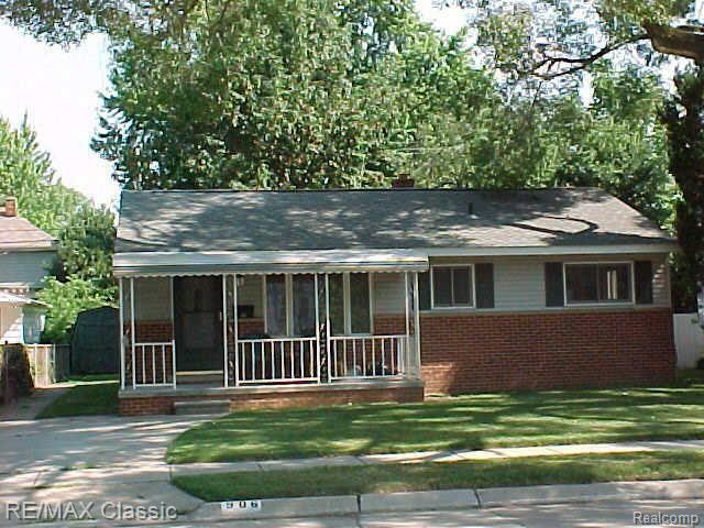 Property Photo:  906 Palmer Street  MI 48170 