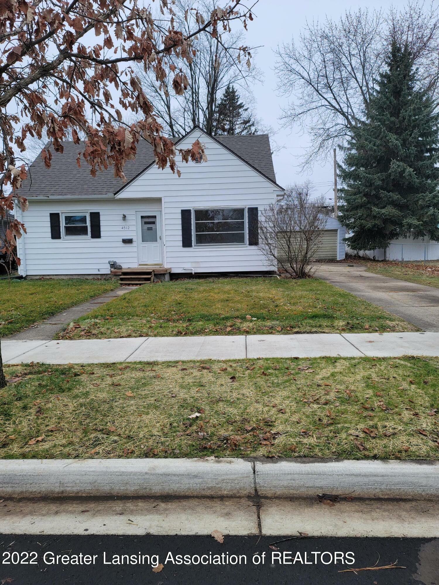 Property Photo:  4512 Devonshire Avenue  MI 48910 