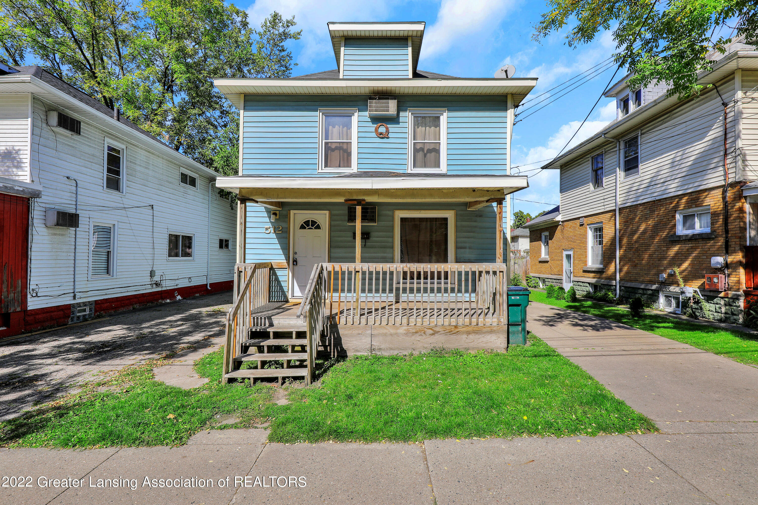 Property Photo:  512 W Oakland Avenue  MI 48906 