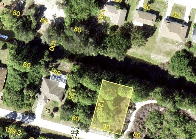 Property Photo:  6997 Sea Mist Drive NW  FL 33981 
