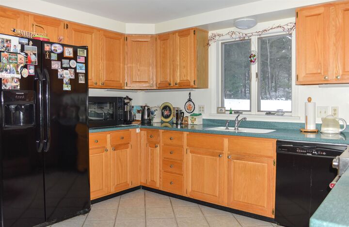 Property Photo:  48 Woodland Heights Drive  NH 03446 