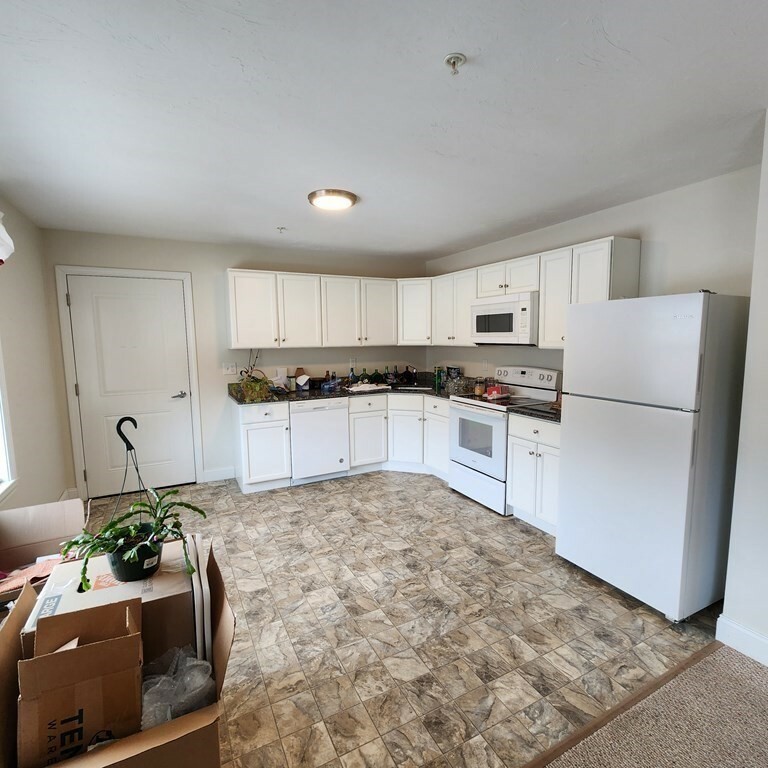 Property Photo: 130 Spring St 202 MA 02048