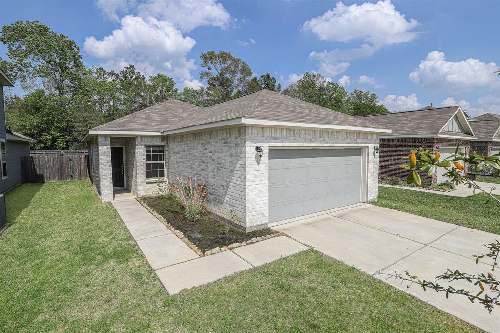 Property Photo:  627 Thicket Bluff Drive  TX 77336 