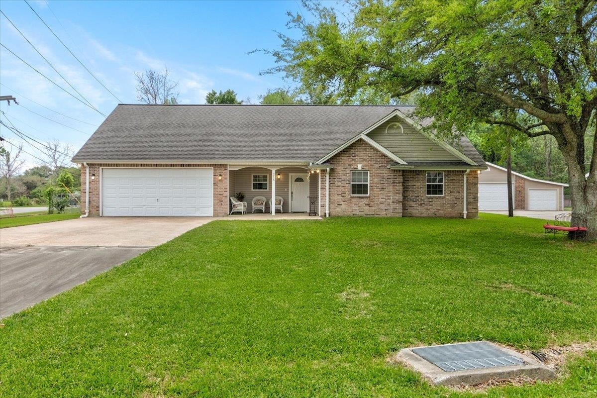 Property Photo:  215 Alice  TX 77611 