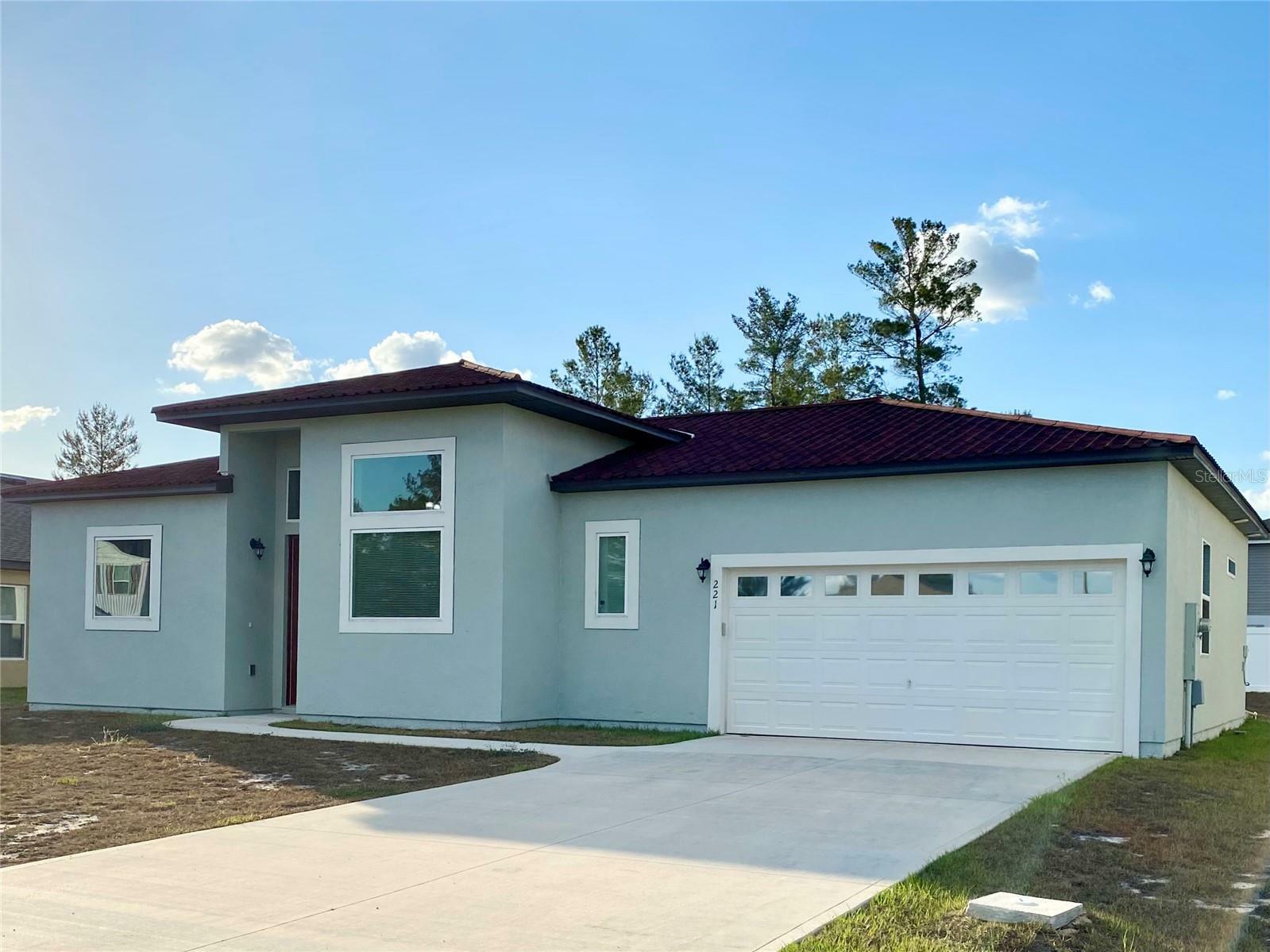 Property Photo:  221 Gladiola Court  FL 34759 