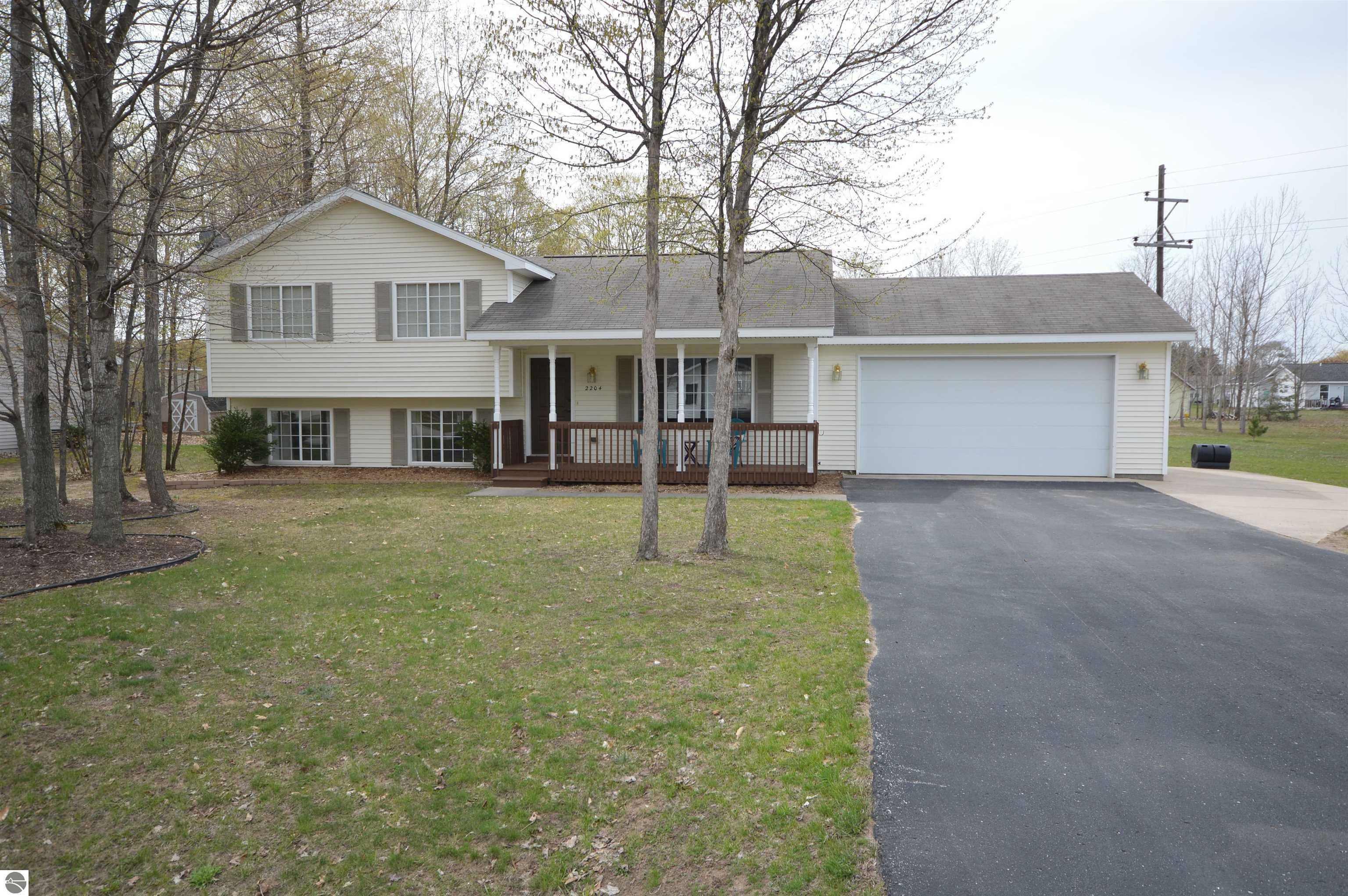 Property Photo:  2204 Woodcock Lane  MI 49685 