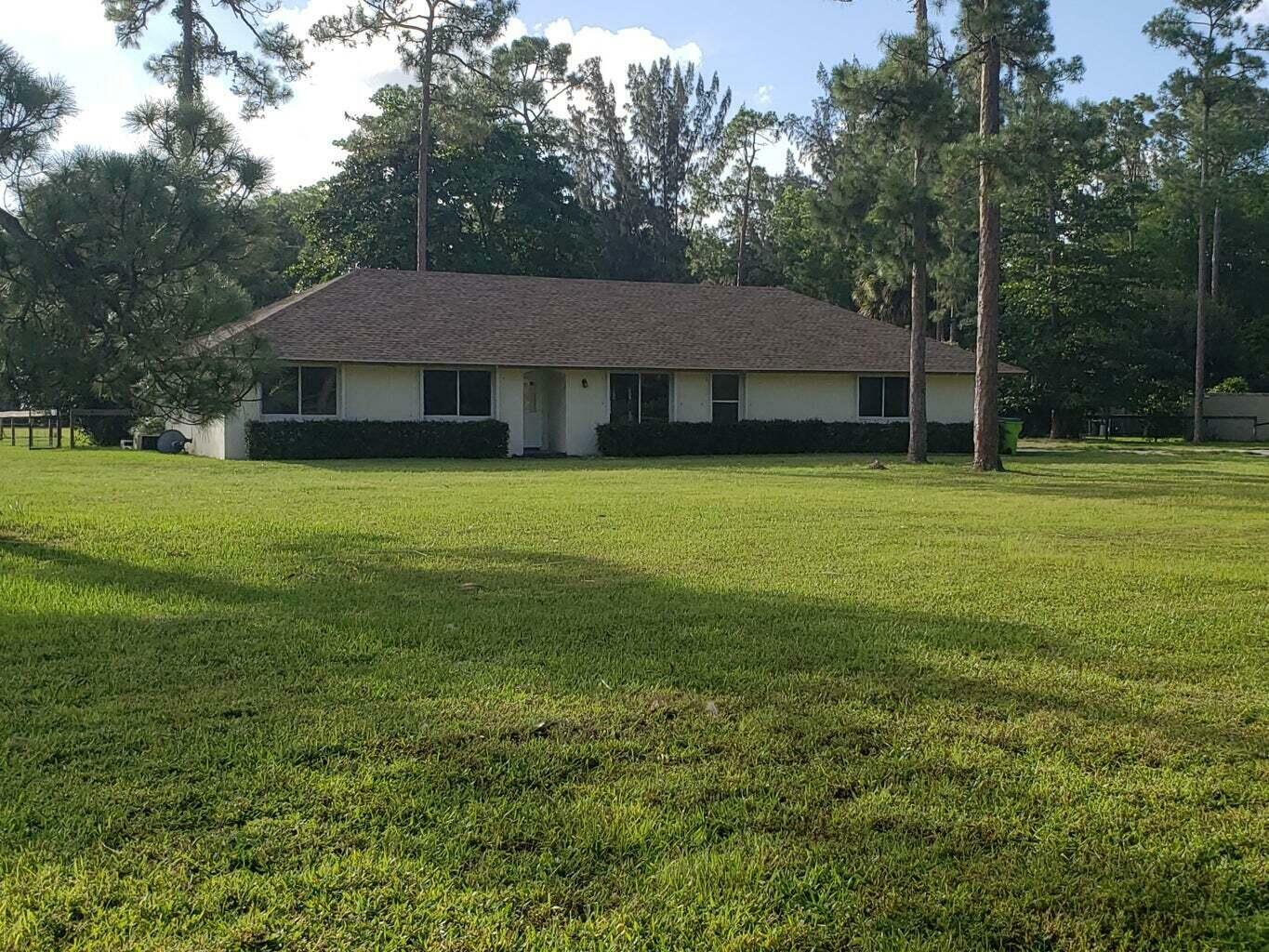 Property Photo: 1031 Hyde Park Road FL 33470