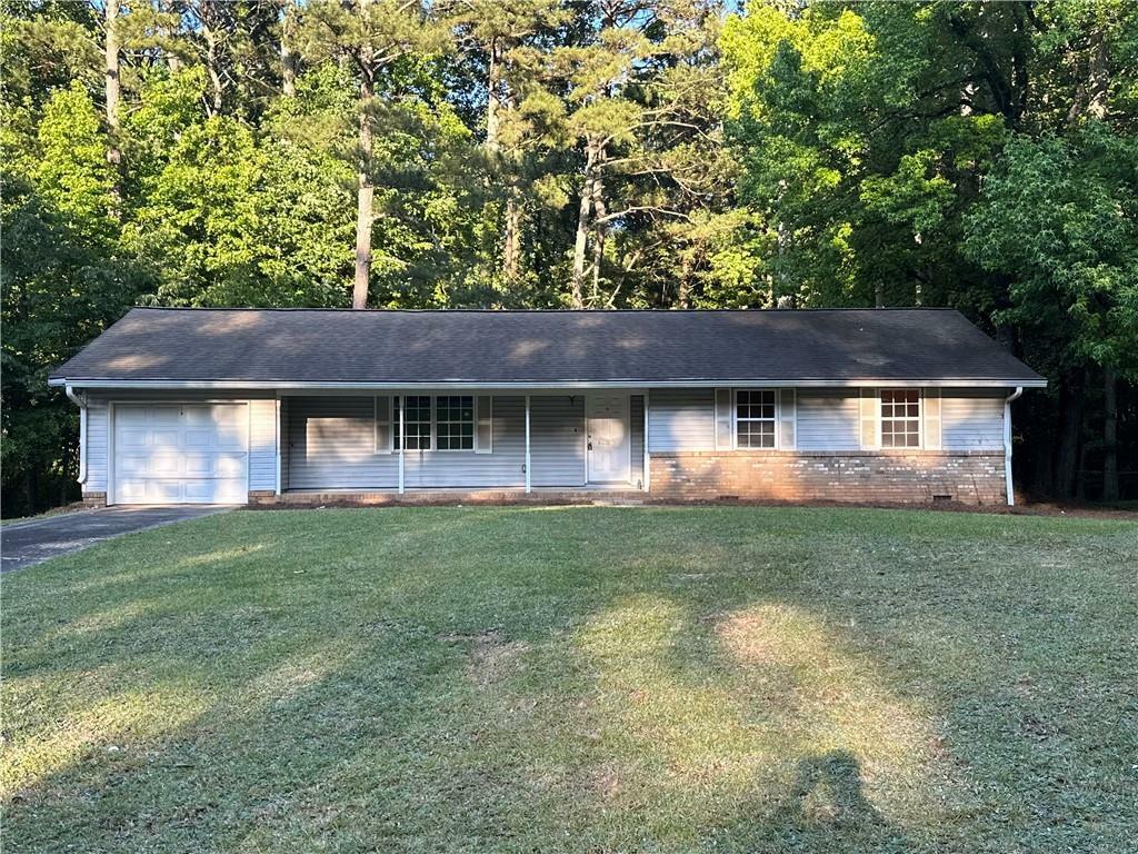 Property Photo:  3411 Pawnee Trail SW  GA 30060 