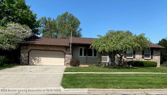 Property Photo:  1102 Hampshire Drive  MI 48879 