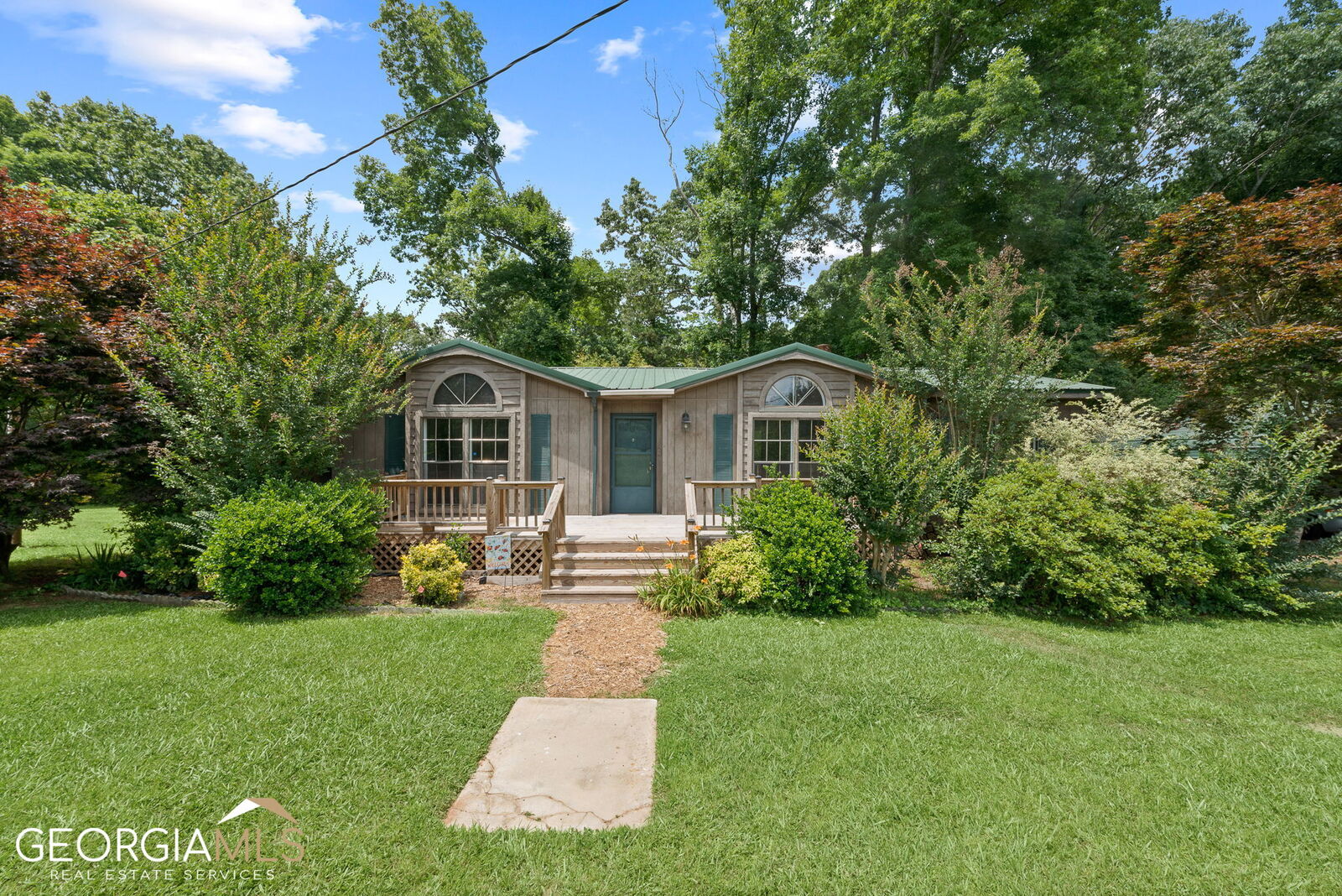 Property Photo:  1302 Little New York Road  GA 30185 