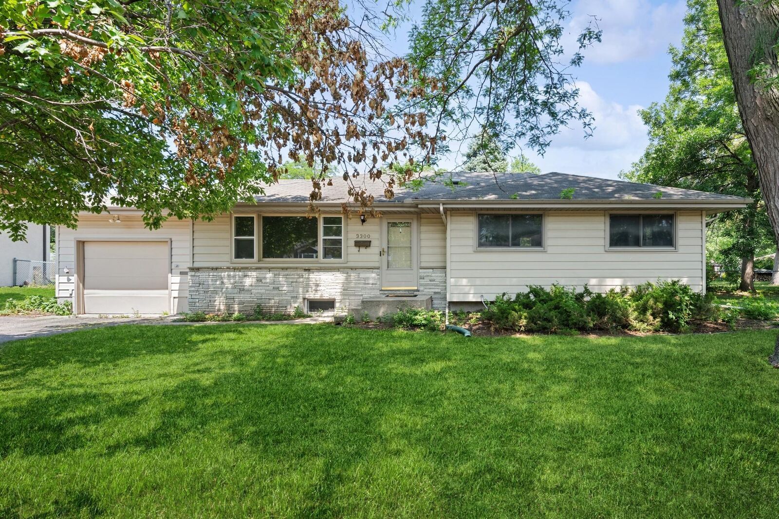 Property Photo:  3300 Poe Road  MN 55429 