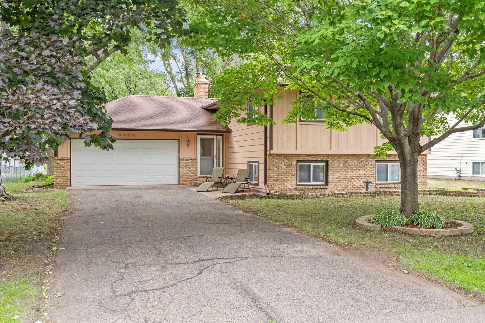Property Photo:  8484 Sunnyside Road  MN 55112 