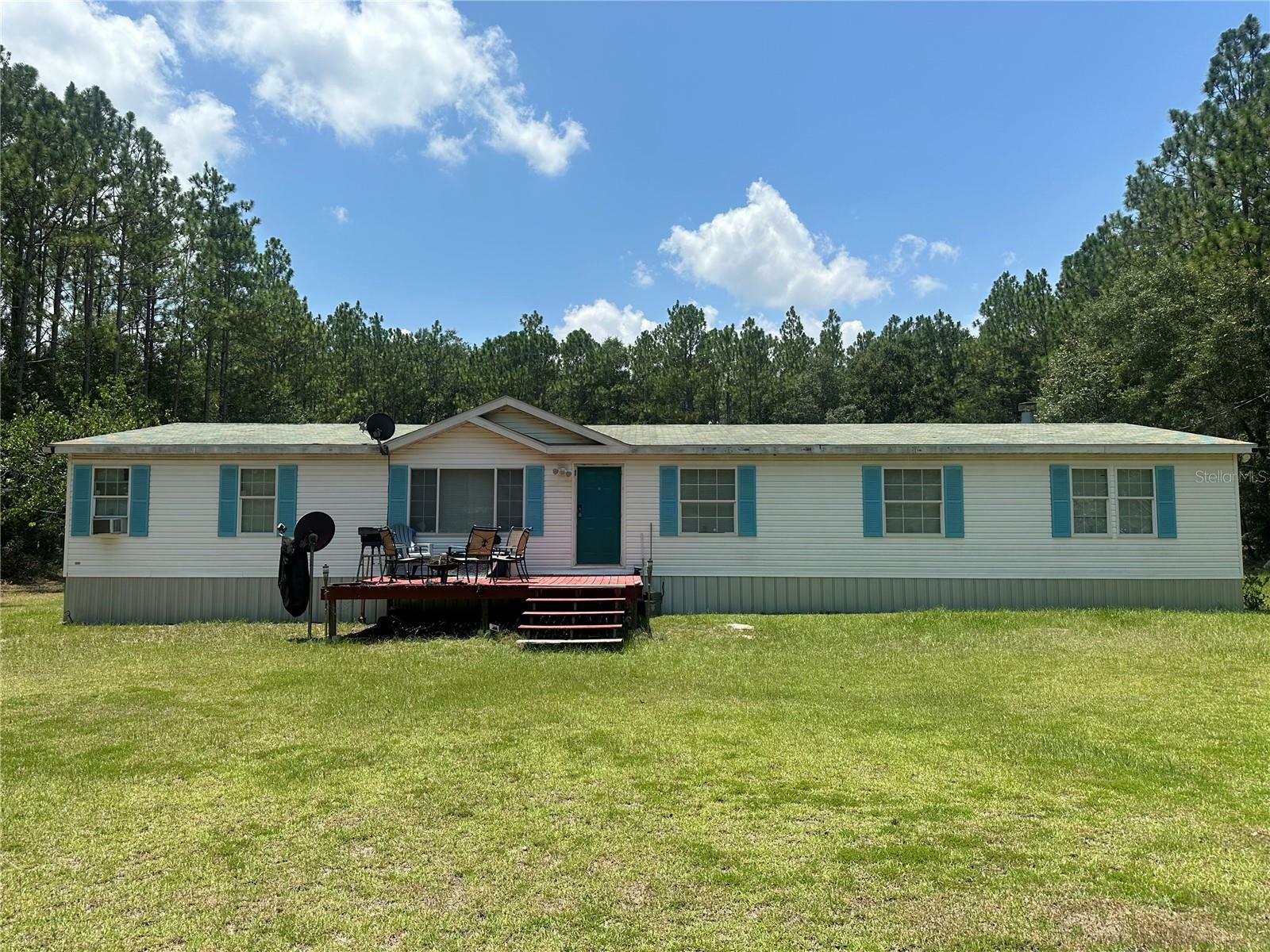 Property Photo:  780 NE Condurango Lane  FL 32059 