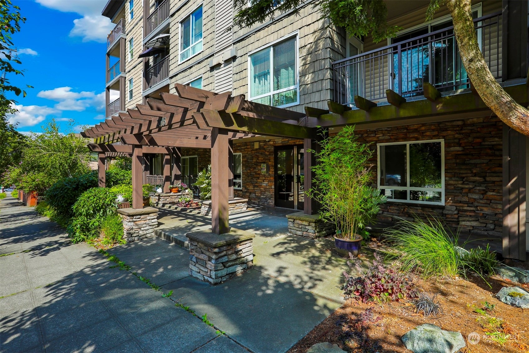 Property Photo:  3015 SW Avalon Way 209  WA 98126 