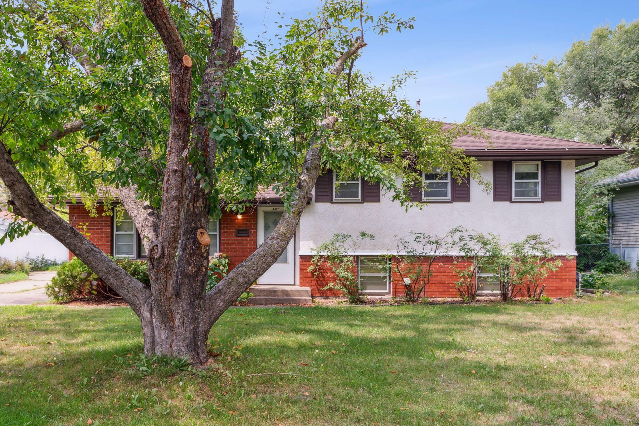 Property Photo: 6407 June Avenue N MN 55429