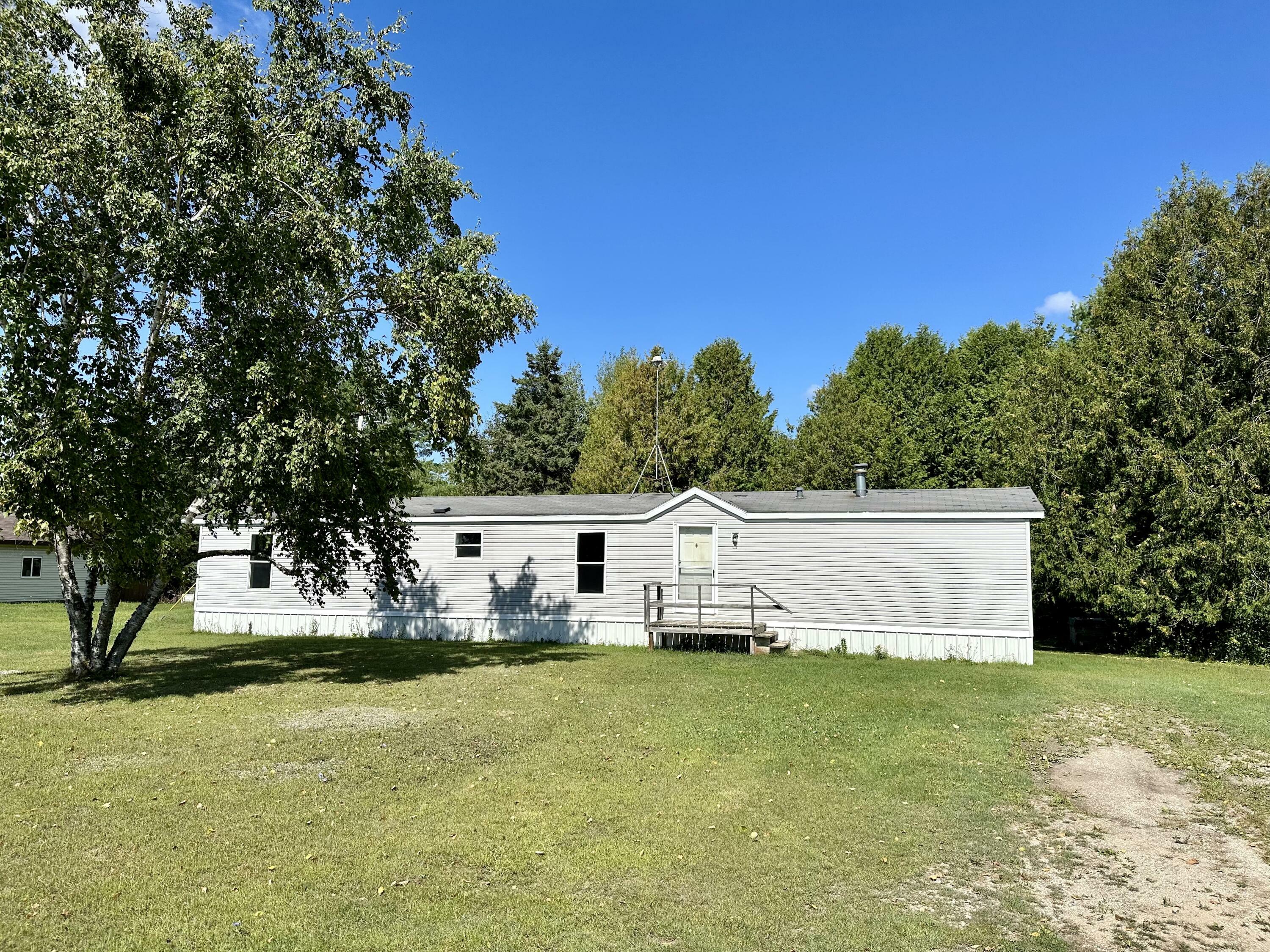 Property Photo:  6040 N Black River Road  MI 49721 