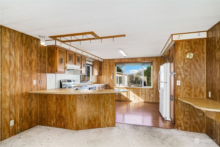Property Photo:  28000 NE 142nd Pl #128  WA 98019 