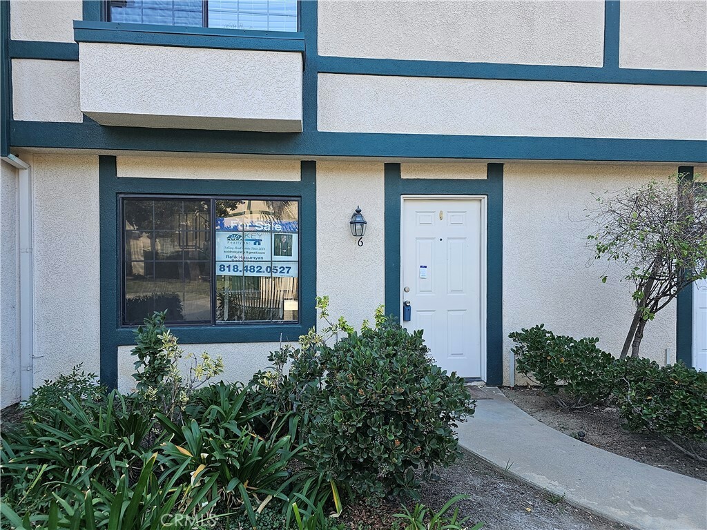 Property Photo:  15230 Roxford Street 16  CA 91342 