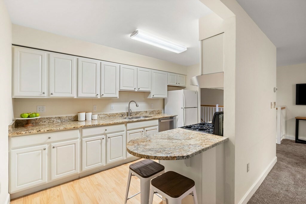 Property Photo: 12 N Stone Mill Dr 1012 MA 02026