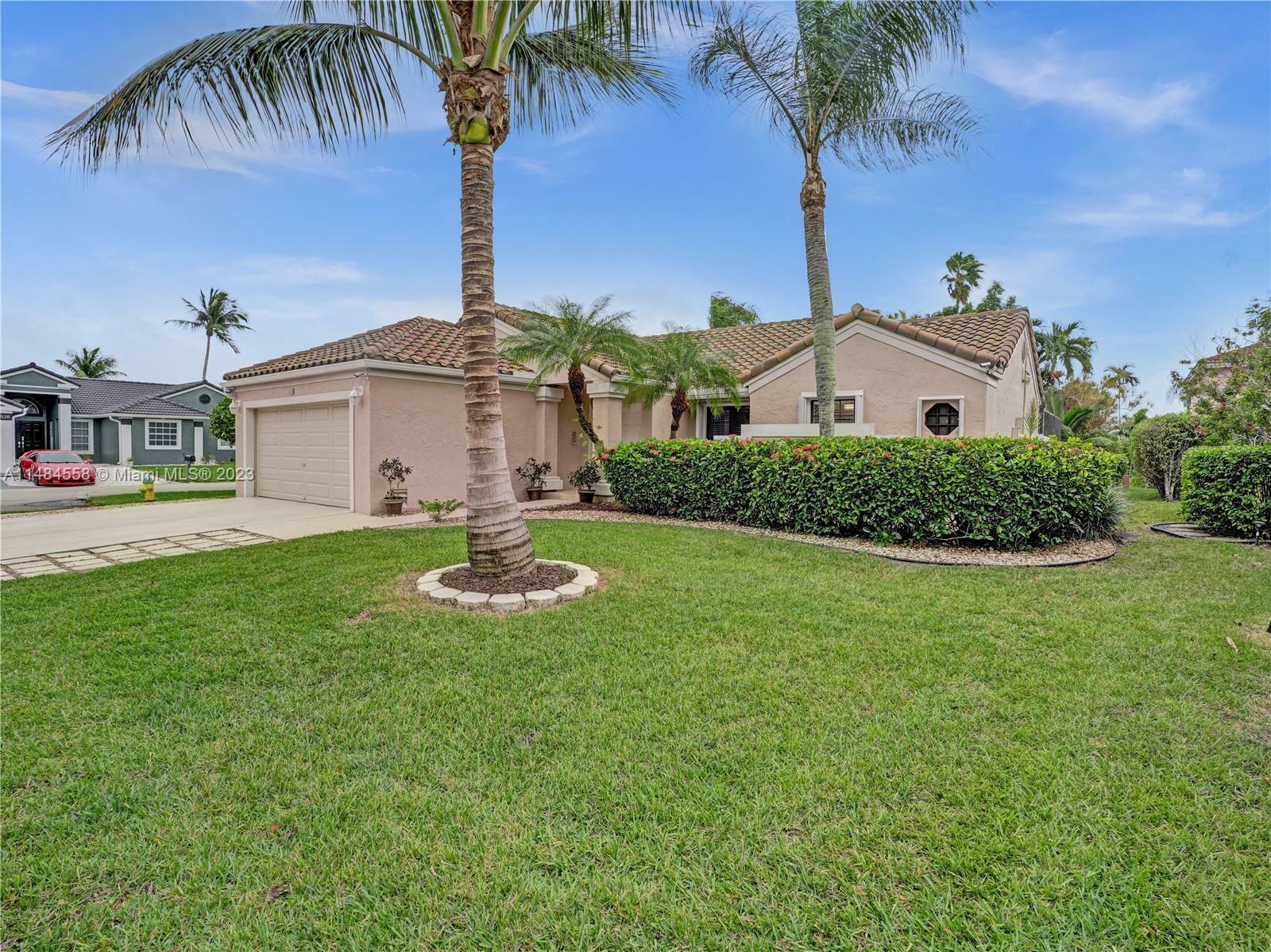 Property Photo:  4718 NW 5th Ct  FL 33442 