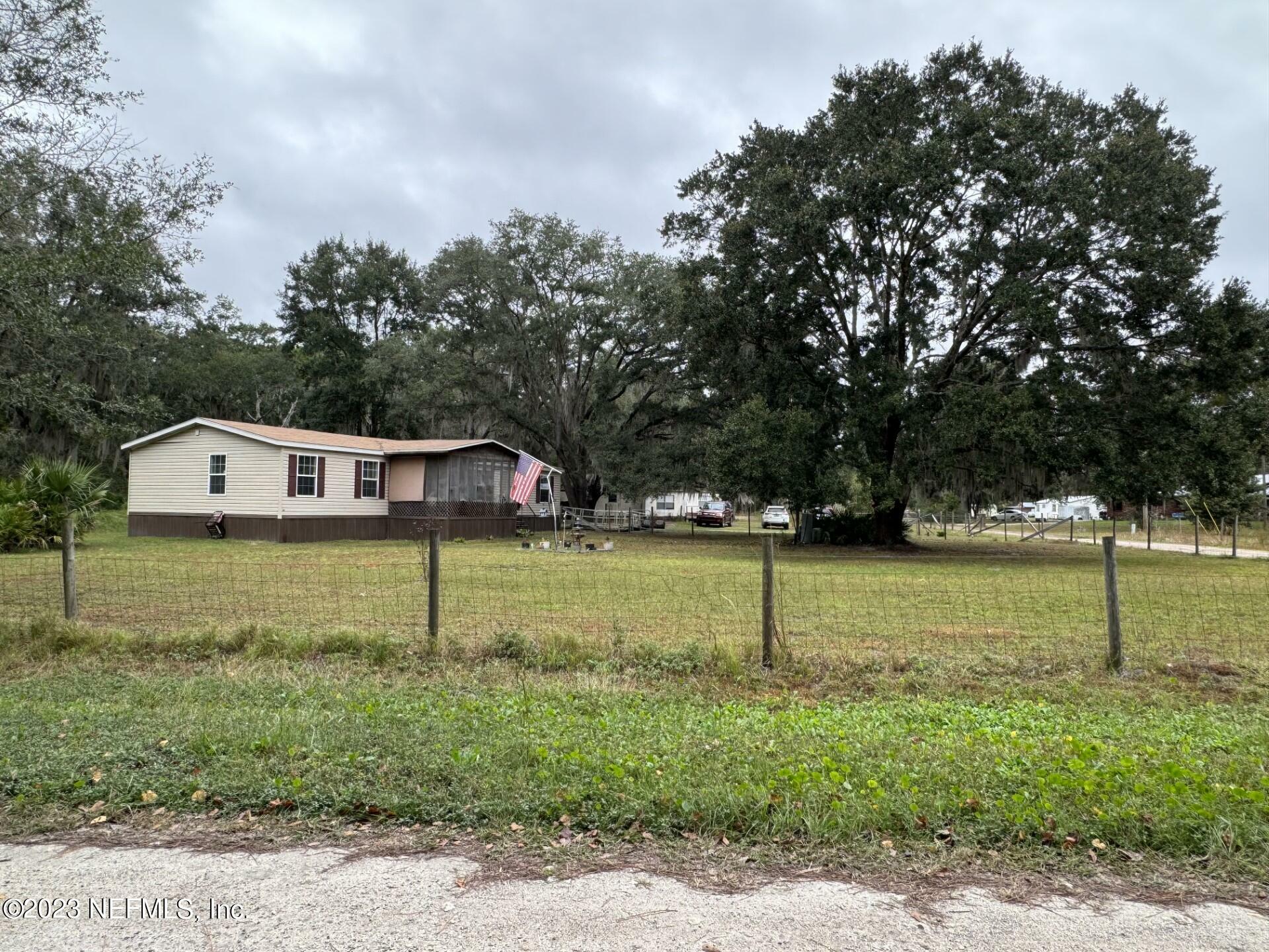 Property Photo:  201 Gas Pipeline Rd  FL 32177 