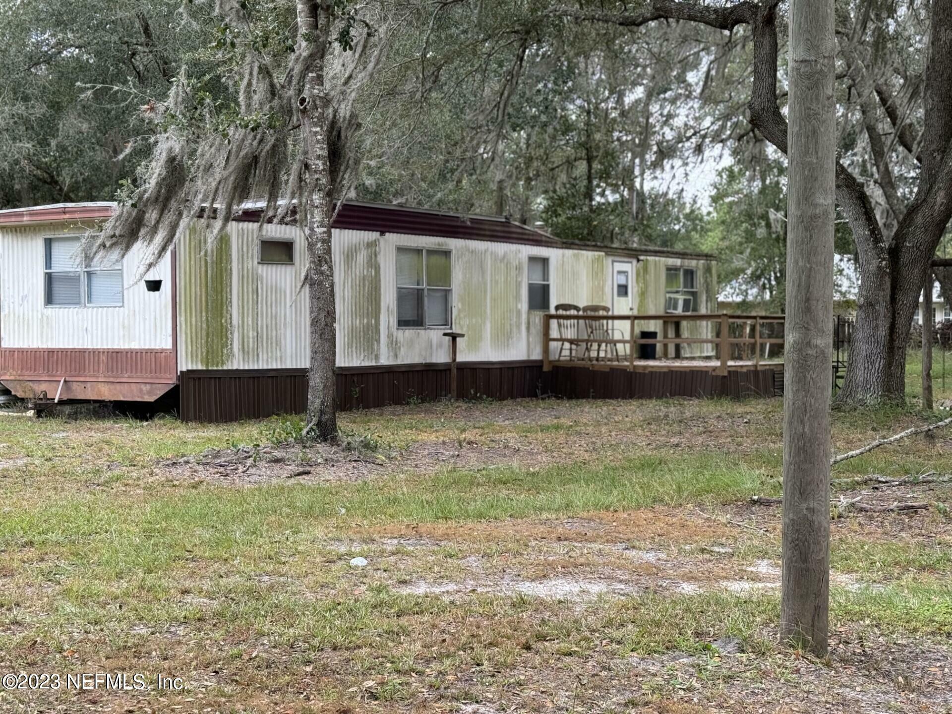 Property Photo:  205 Gas Pipeline Rd  FL 32177 