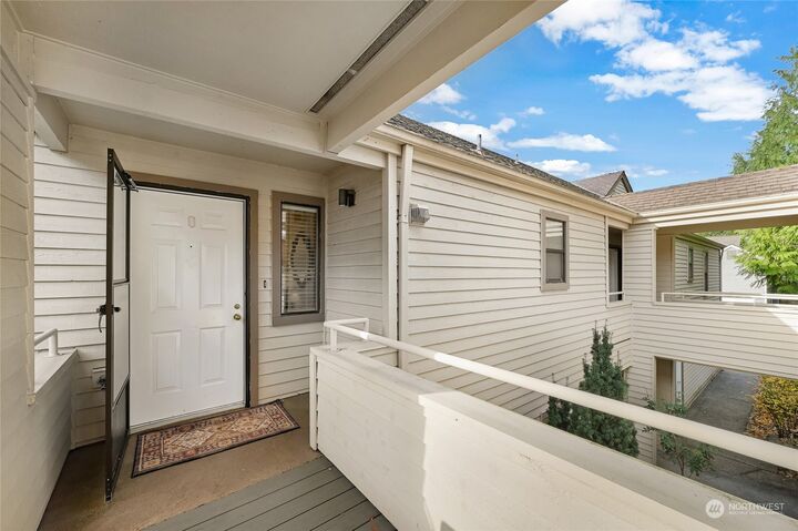 Property Photo:  4139  223rd Place SE 2070  WA 98029 