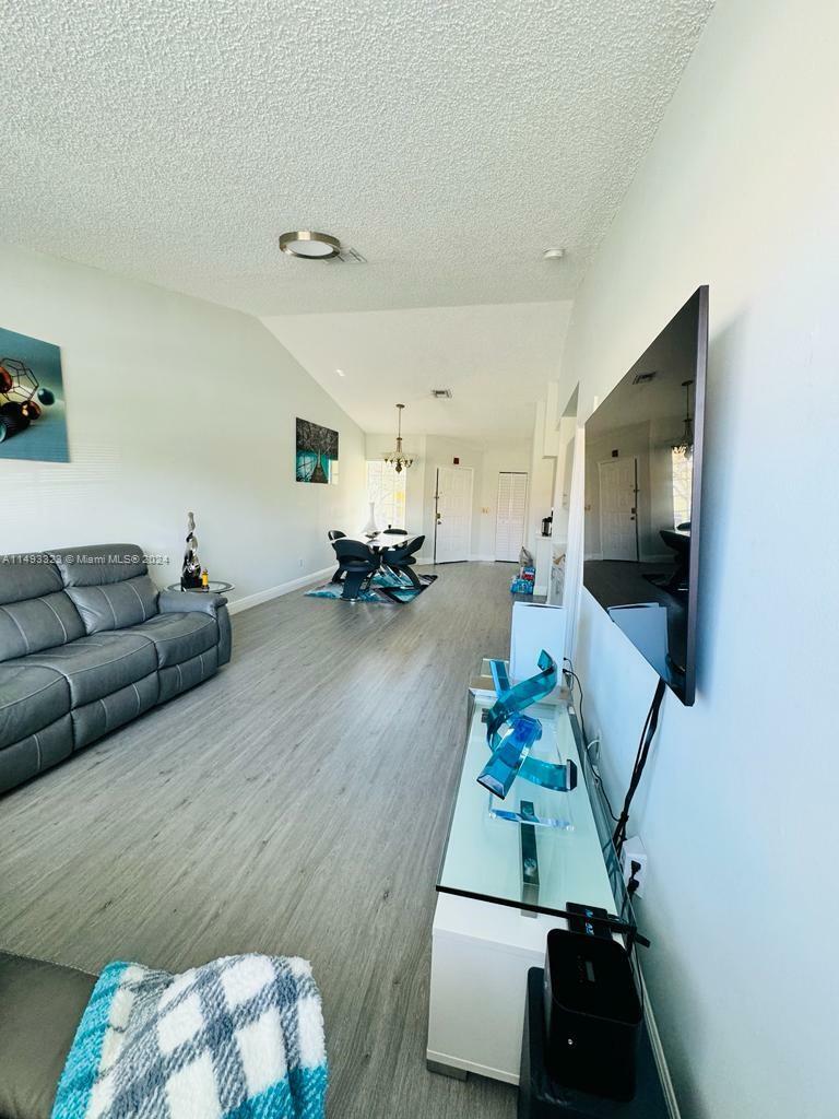 Property Photo:  18334 NW 68th Ave L  FL 33015 