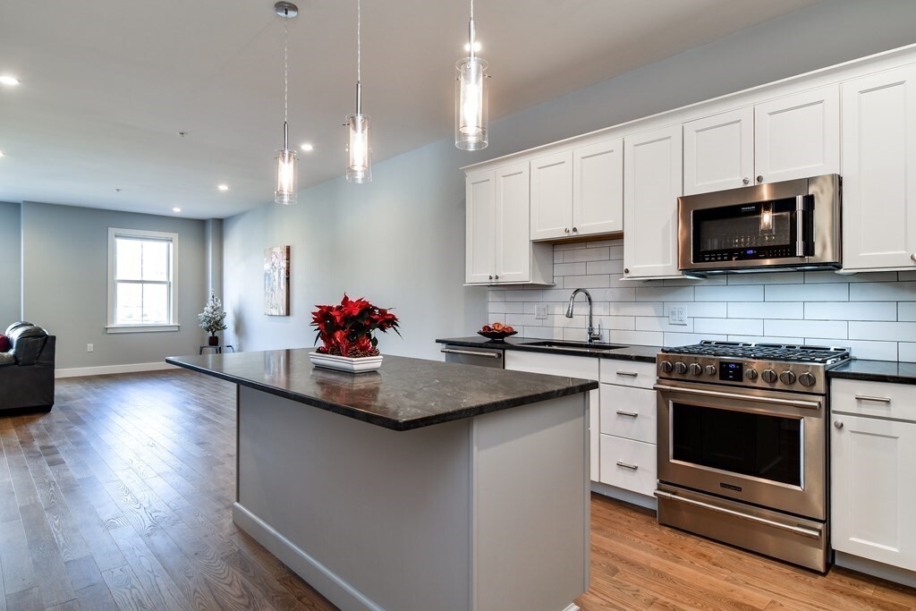 Property Photo: 9 Independence Ave 303 MA 02184