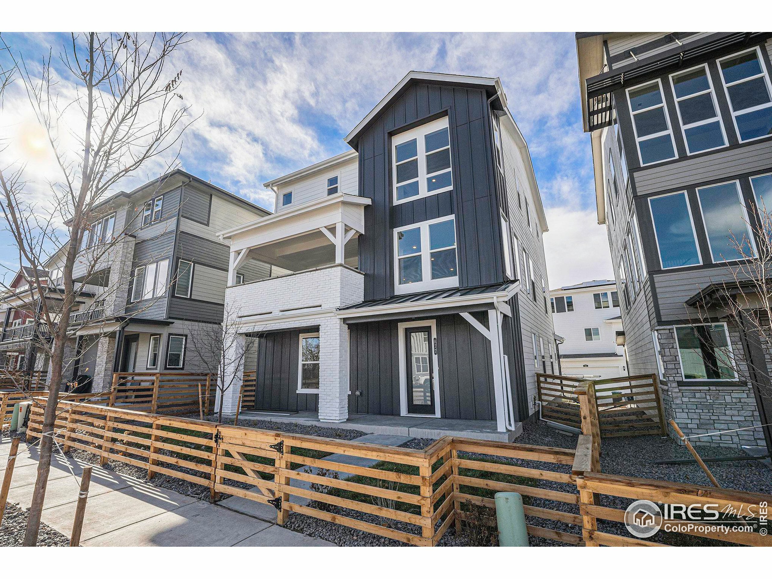 Property Photo: 877 Furrow Way CO 80026