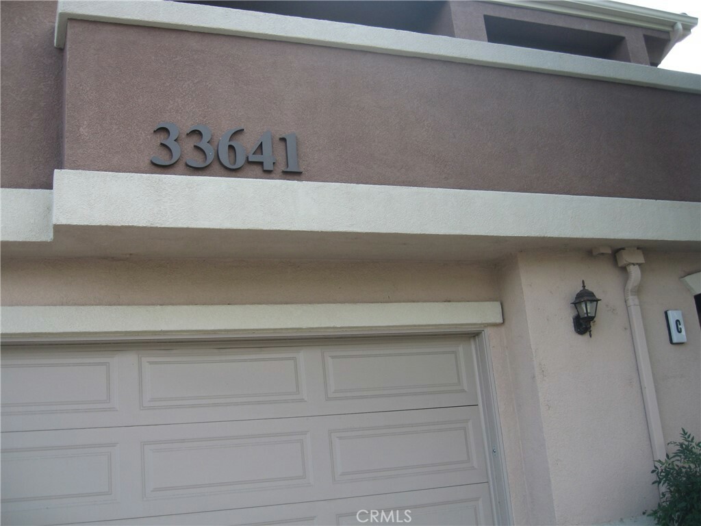 Property Photo:  33641 Emerson Way C  CA 92592 