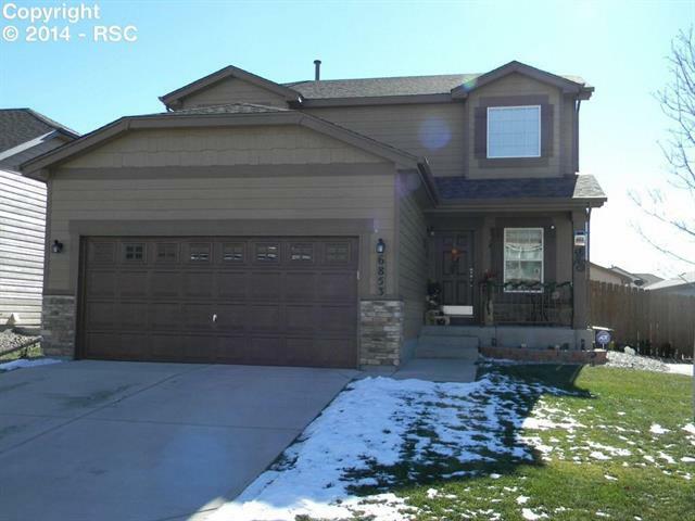 Property Photo:  6853 Dusty Miller Way  CO 80908 