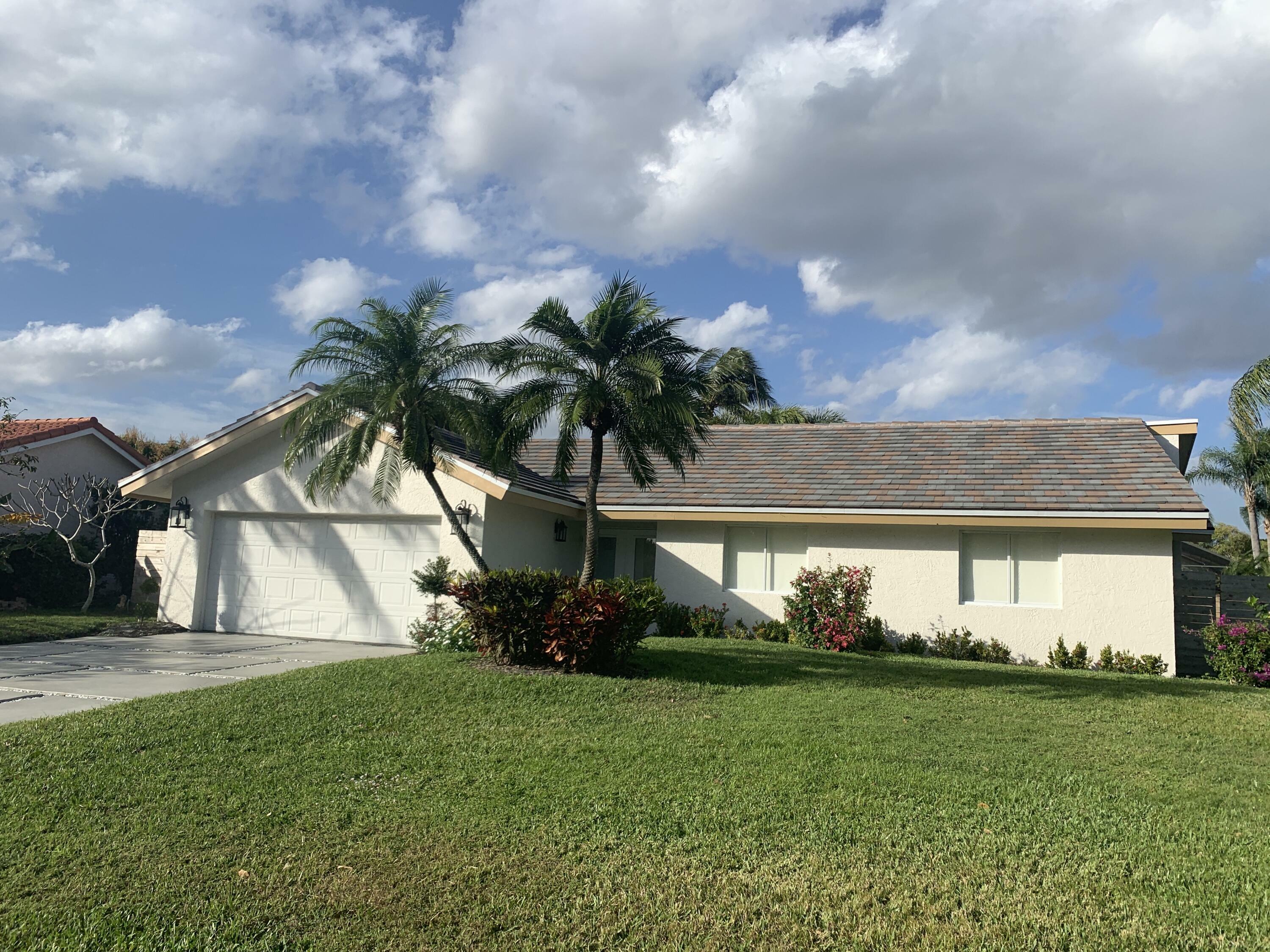 Property Photo:  2403 NW 30th Road  FL 33431 