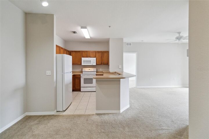 Property Photo:  8225 Claire Ann Dr 203  FL 32825 