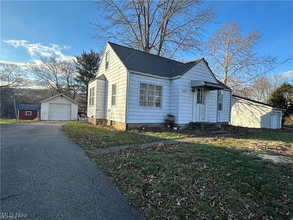 Property Photo:  6443 Cleveland Avenue SE  OH 44626 