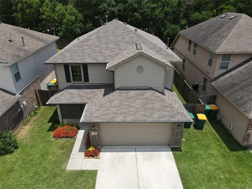 Property Photo: 10009 Sterling Place Drive TX 77303