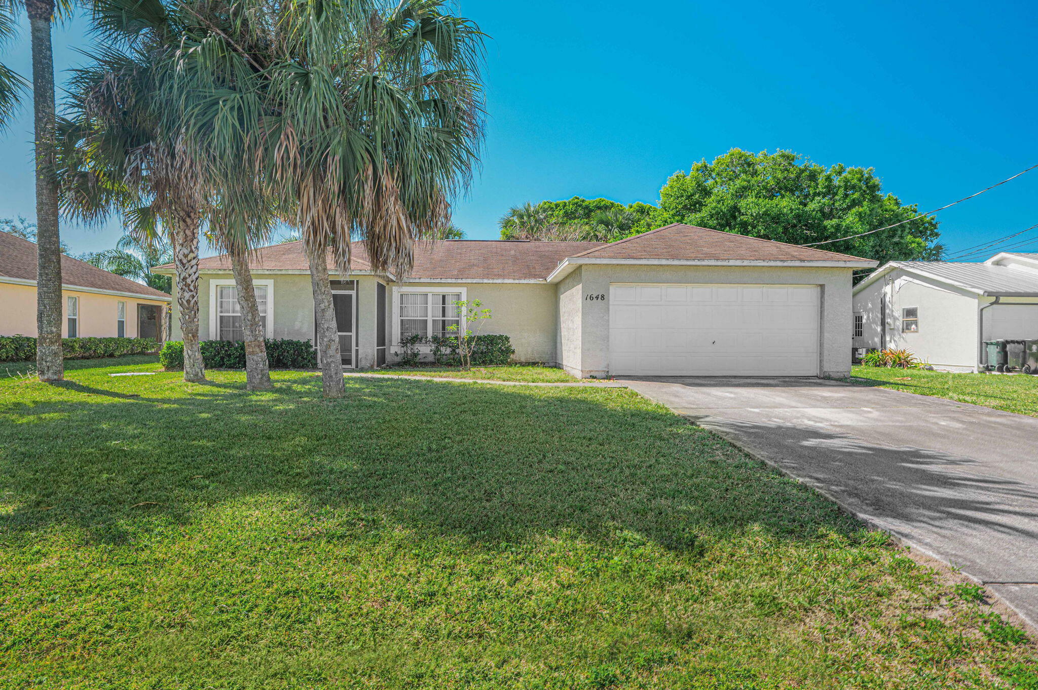 Property Photo:  1648 SW Ocean Cove Avenue  FL 34953 