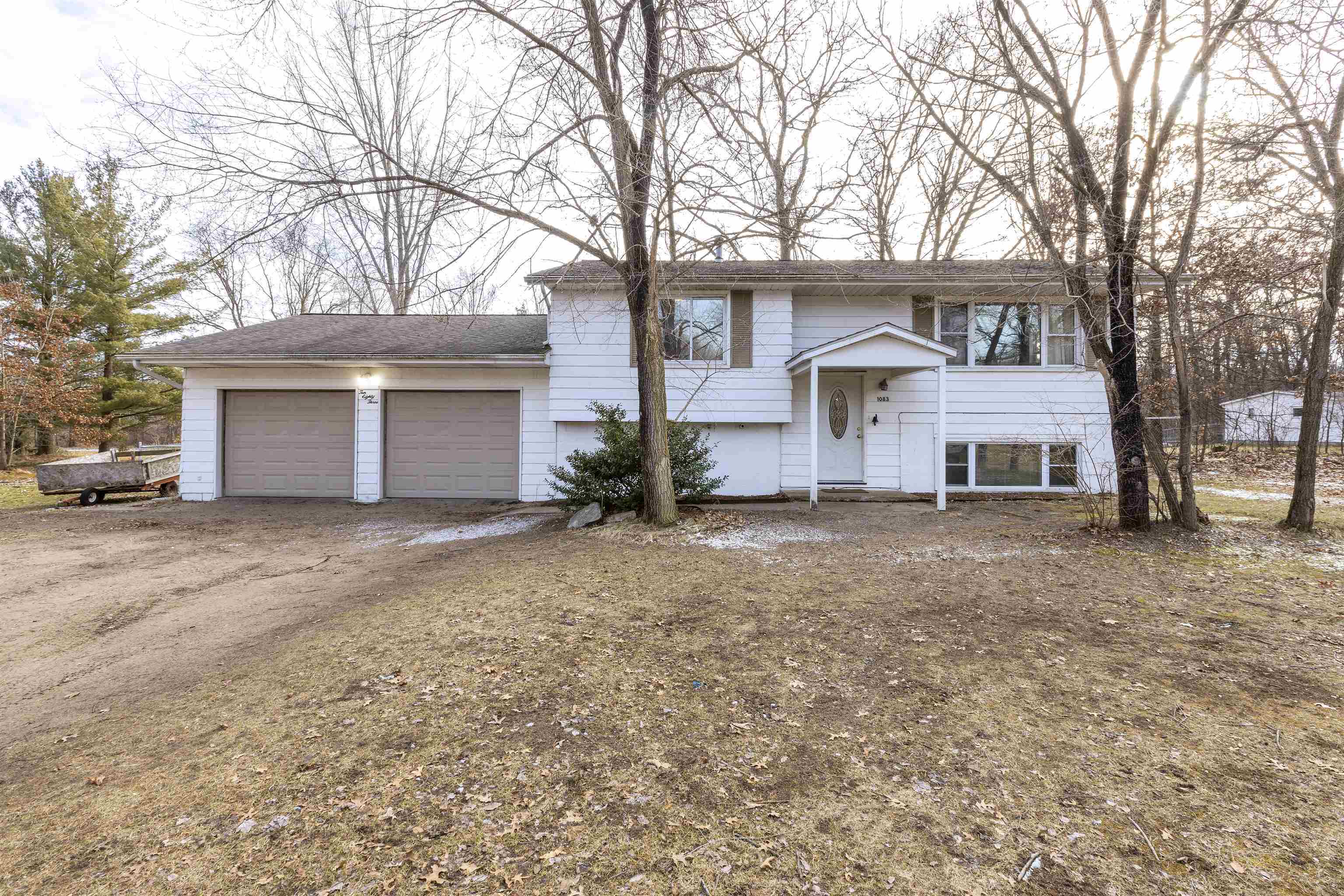 Property Photo:  1083 W McConnell  MI 48640 