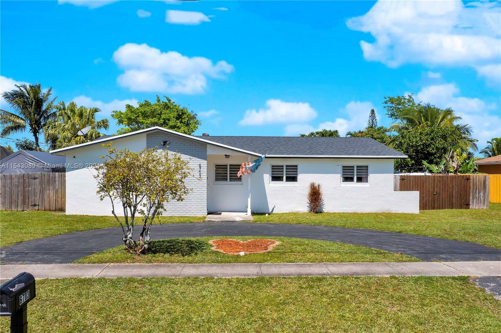 Property Photo:  6703 Winfield Blvd  FL 33063 