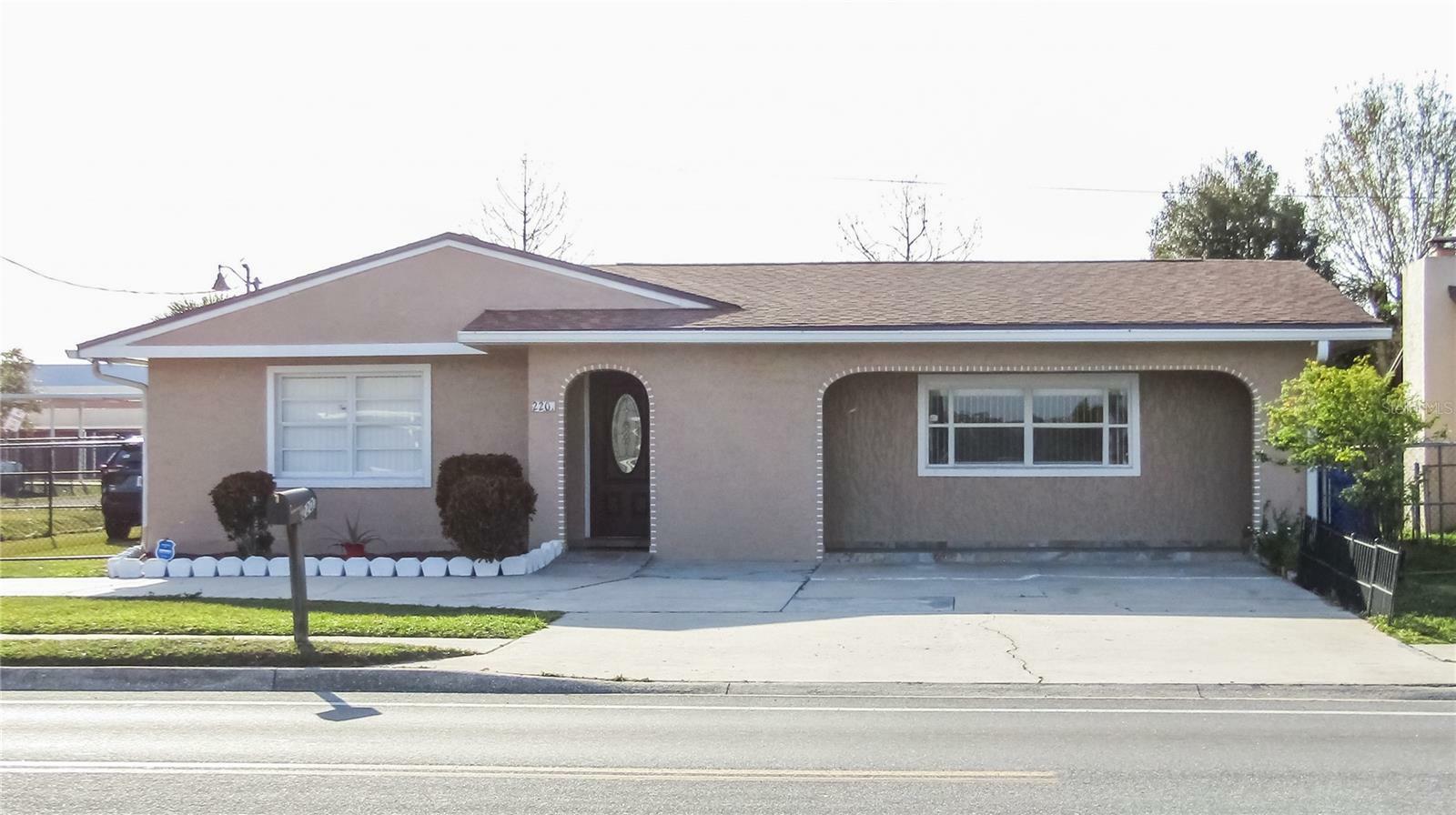 Property Photo: 220 S Thacker Avenue FL 34741