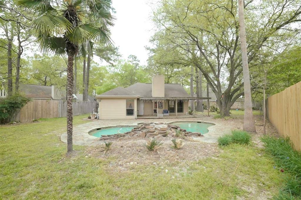 Property Photo:  1906 Woodhue Dr  TX 77386 