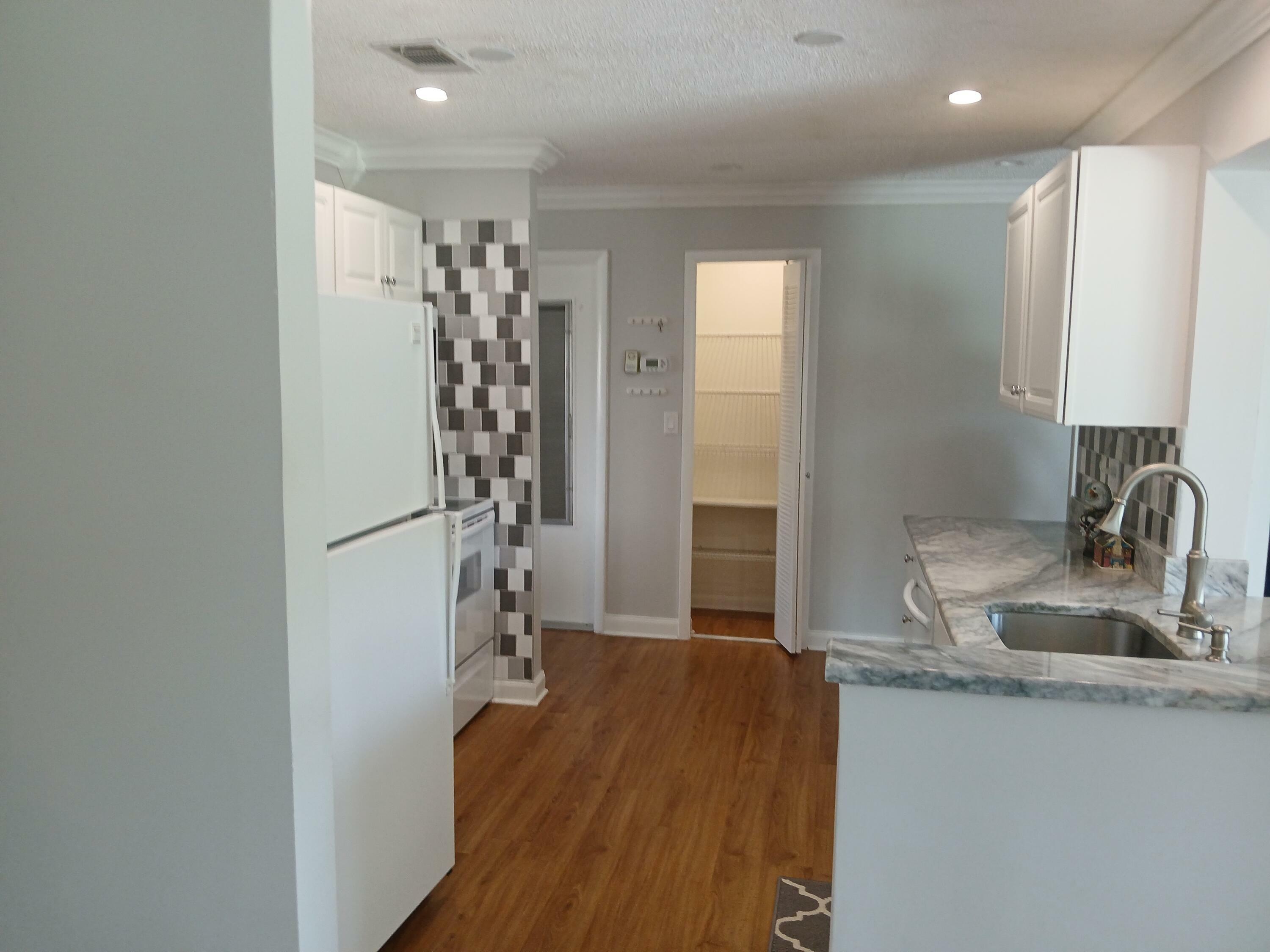 Property Photo:  1010 SW 15th Street W  FL 33426 